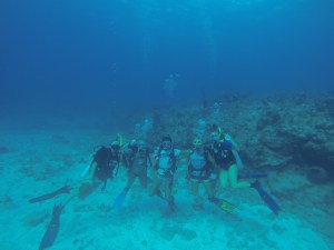 repping our college apparel 60 ft underwater